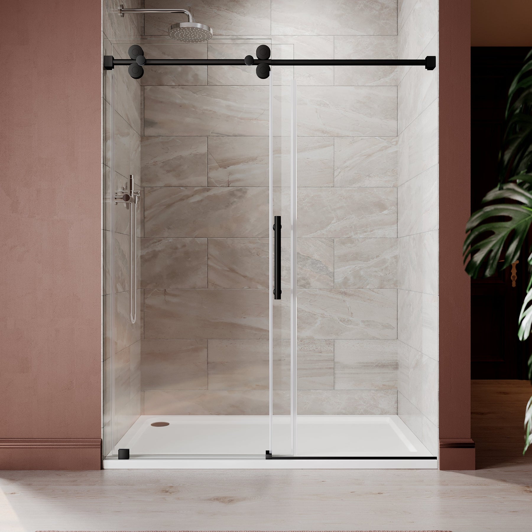 Frameless sliding shower door with matte black hardware installed in a modern bathroom with large format tile