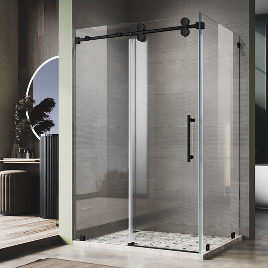 Frameless sliding shower door with matte black hardware and 10mm tempered glass installed in a modern bathroom with textured tile wall and no bottom track